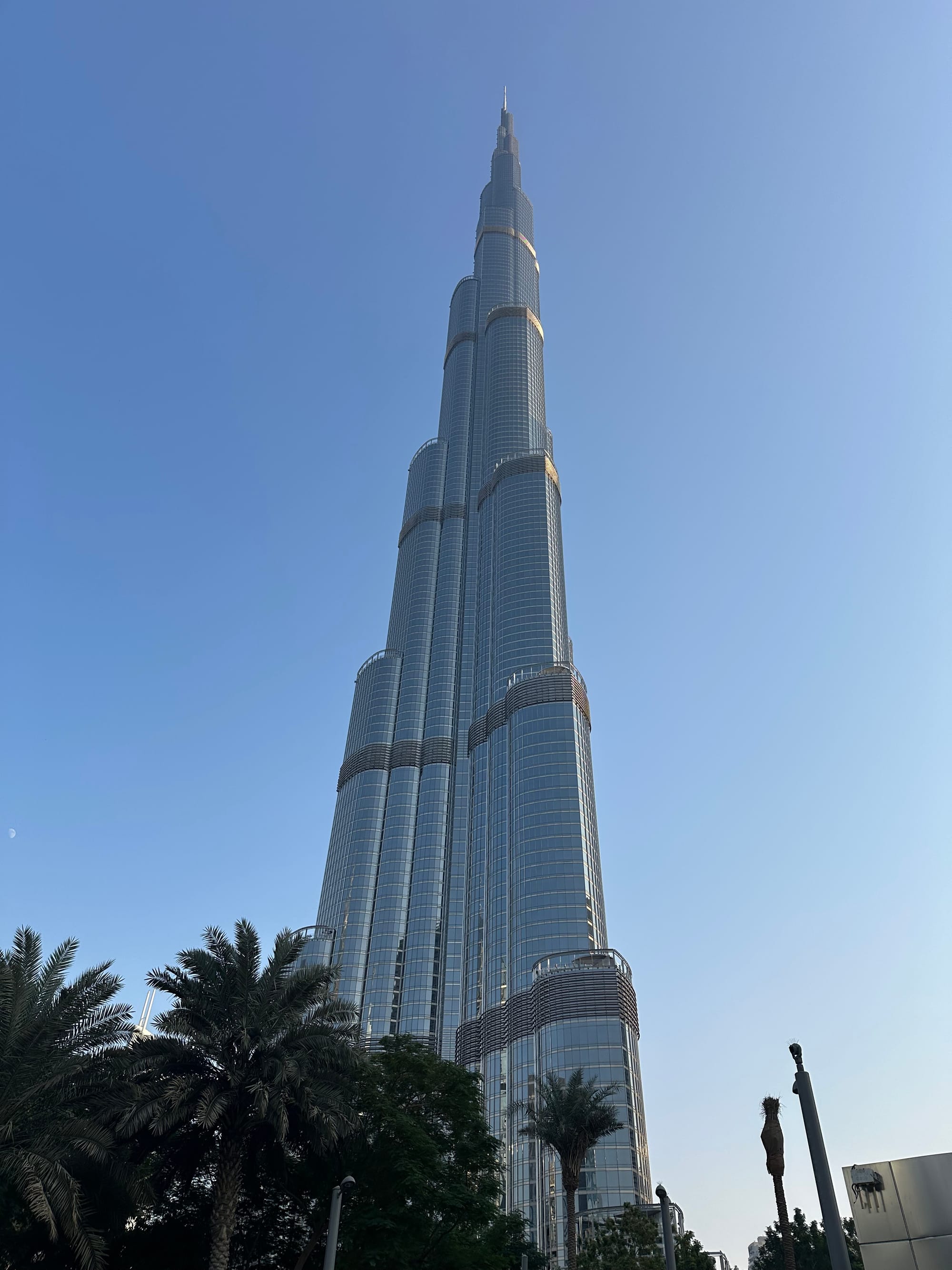 A view of the Burj Khalifa in the daytime, taken from the ground.