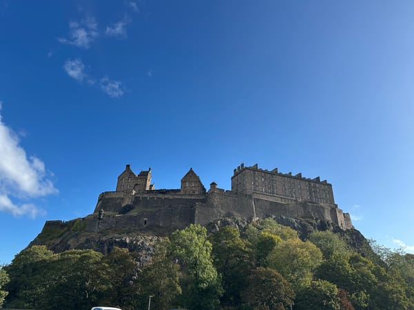 A photo of Edinburgh Castle, viewed from a nearby street.